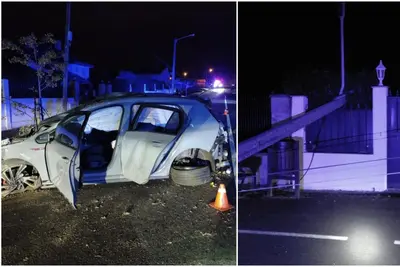 Accidente de tráfico en Oleiros provoca derrumbe de muro y caída de árboles